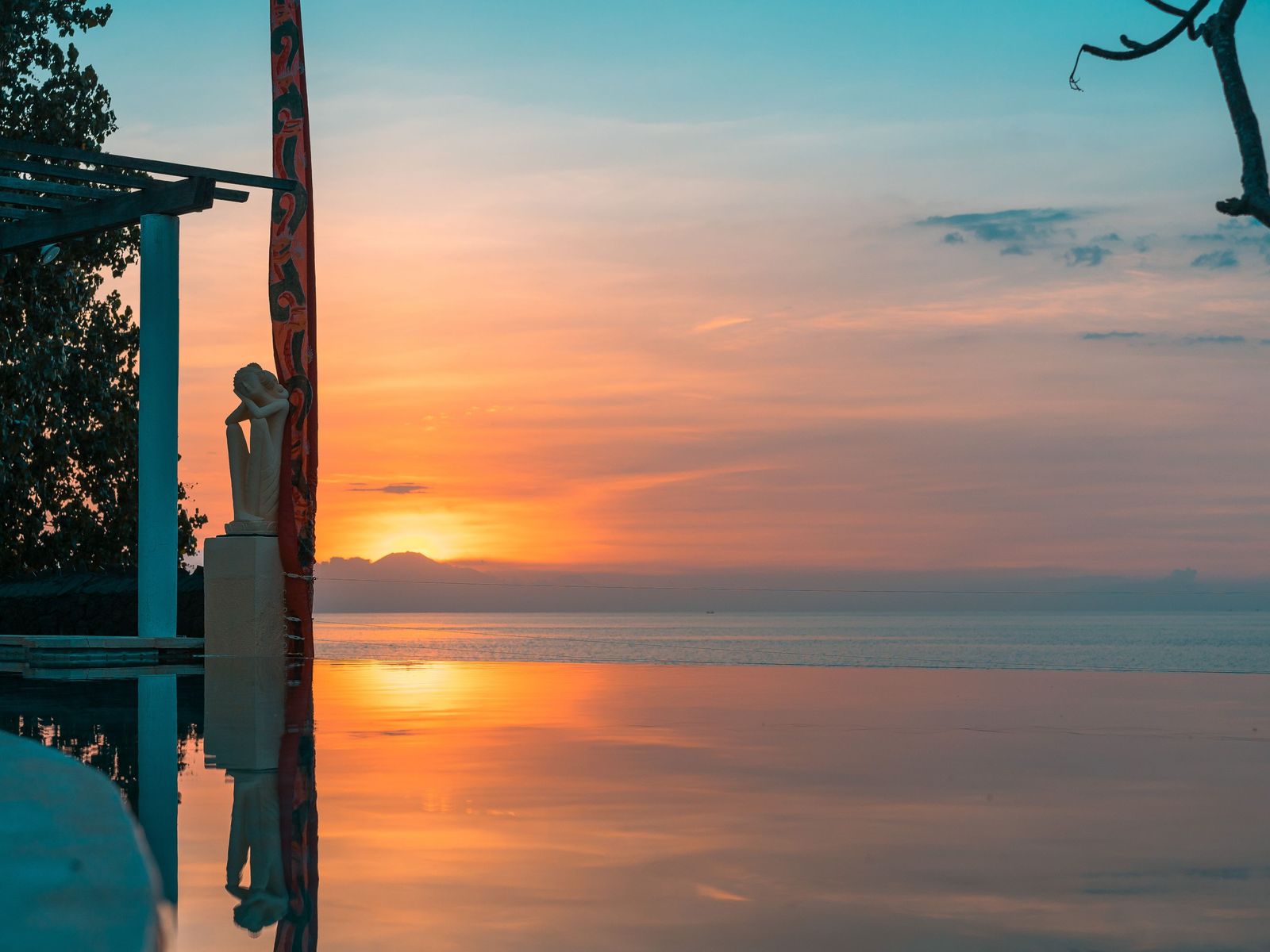 An infinity pool at sunset