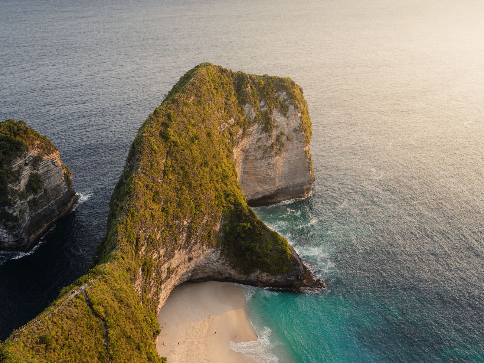 Kelingking headland in warm low light